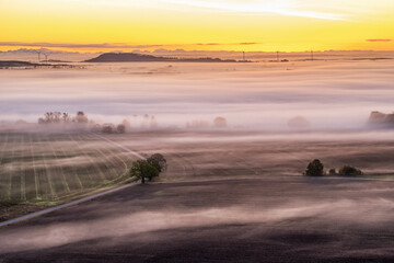 Fototapeta premium Sunrise with fog in the landscape
