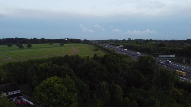 Aerial View of British Motorways With Fast Moving Traffic at Peak Time. M1 J11 and  J7 Motorways Junction Interchange. Time Lapse Shot captured on 7th Sep 2022