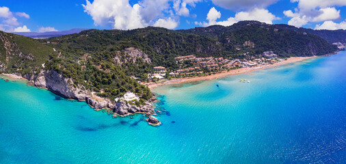 Greece summer holidays. Best scenic beaches of Corfu island - aerial panoramic view of Glyfada beach and village in western part