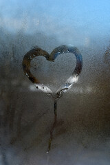 Heart painted on misted glass