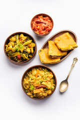 Bengali Bhog food for Indian Hindu Durga Puja or pooja festival. Khichadi, labra, tomato chutney