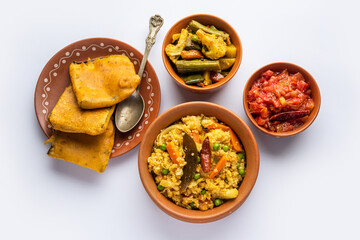 Bengali Bhog food for Indian Hindu Durga Puja or pooja festival. Khichadi, labra, tomato chutney