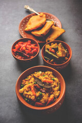 Bengali Bhog food for Indian Hindu Durga Puja or pooja festival. Khichadi, labra, tomato chutney