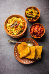 Bengali Bhog food for Indian Hindu Durga Puja or pooja festival. Khichadi, labra, tomato chutney
