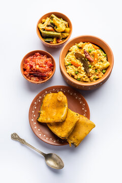 Bengali Bhog food for Indian Hindu Durga Puja or pooja festival. Khichadi, labra, tomato chutney