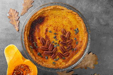  Traditional American pumpkin pie with pecans top view, homemade pumpkin pie, pumpkin baked