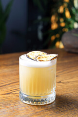 Whisky sour cocktail with foam. Classic drink with whiskey, bourbon, lemon juice, sugar and egg...