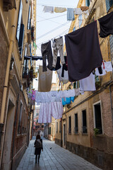 Fototapeta na wymiar Drying laundry on the street of Venice
