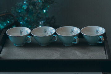 Row of Blue Flowered Coffee or Tea Cups
