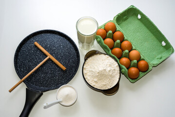Ingredients for making pancake dough egg, milk, flour