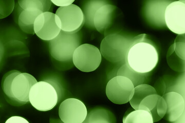 Blurred lights, green background. Abstract bokeh with soft light