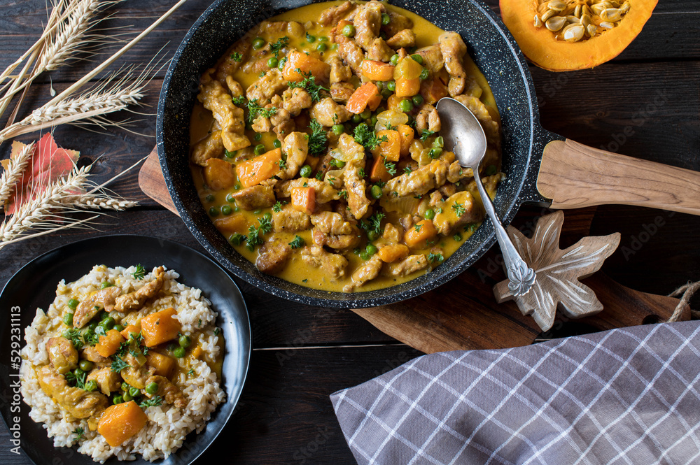 Wall mural Chicken curry with pumpkin and vegetables