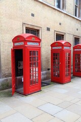 Obraz na płótnie Canvas London telephone booth row