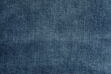 Fototapeta na wymiar Texture of dark blue jeans as background, closeup