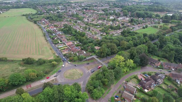 Aerial View of British Motorways With Fast Moving Traffic at Peak Time. M1 J11 and  J7 Motorways Junction Interchange. Time Lapse Shot captured on 7th Sep 2022