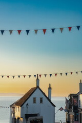 Celebration flags during summer events in beautiful coastal town of Lyme Regis, Dorset