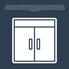 Blue line Wardrobe icon isolated on blue background. Vector