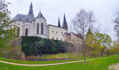 Fototapeta na wymiar 2022-04-20 panoramic view of park under Saint Wenceslas Cathedral with Olomouc castle wall. Olomouc, Czech Republic.