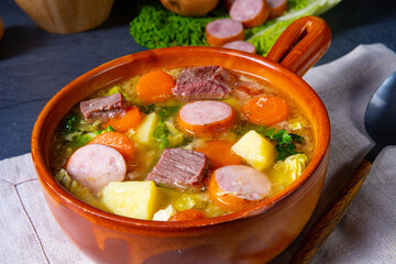 Delicious savoy cabbage stew in a rustic bowl