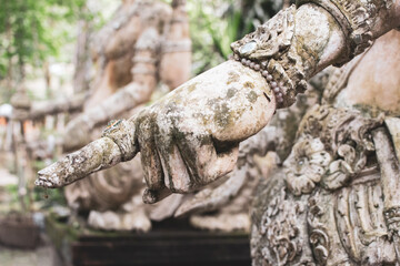 Hand of Ancient statue in Temple of Thailand