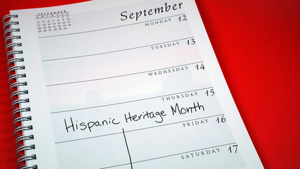 Obraz premium Hispanic Heritage Month marked on a calendar from September 15-October 14, 2022.