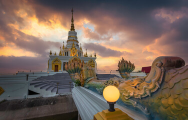 
Wat Saen Suk Chedi, Chonburi, Thailand during the sunset in front of the Naga statue