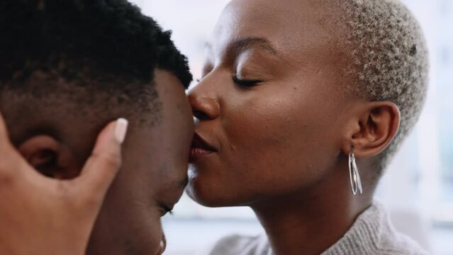 Love, comfort and happy black couple giving hug, kiss and commitment in sequence while sharing a romantic moment. Closeup of African man and woman in a healthy marriage and relationship
