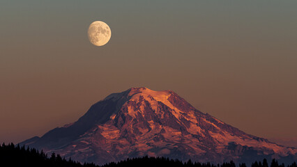 Harvest moon over Mt Rainier 