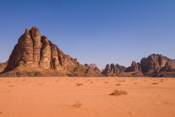 Wadi Rum Desert landscape in Jordan. Dunes and mountains. Travel and tourism concept.