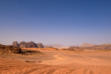 Fototapeta na wymiar Wadi Rum Desert landscape in Jordan. Dunes and mountains. Travel and tourism concept.
