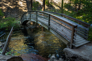 Wooden bridge over a stream