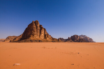 Wadi Rum Desert landscape in Jordan. Dunes and mountains. Travel and tourism concept.