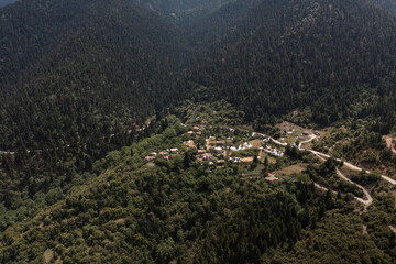 Fototapeta na wymiar Aerial view of small Greek village in the mountain 