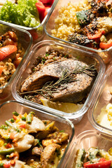 Meal healthy ration for the day in transparent glass bowl. A set of dishes in containers. Delicious food with home delivery. Take away of fitness meal