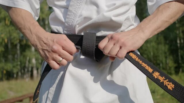 Black belt. Karate. Training in nature.