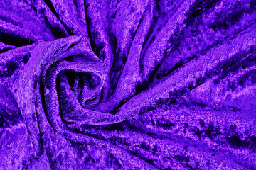 Fototapeta na wymiar Purple panne velvet textile texture with folds