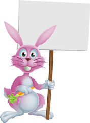 Pink bunny rabbit with carrot and sign