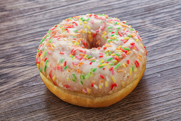 Sweet glazed vanilla donut with icing