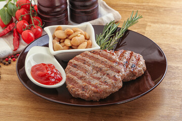 Grilled beef burger cutlet with sauce