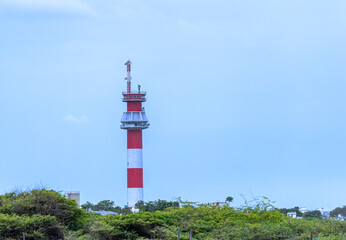 Fototapeta na wymiar A Lighthouse near a sea beach