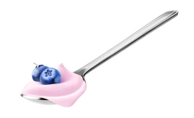 Spoon of fruit yogurt with blueberries on top