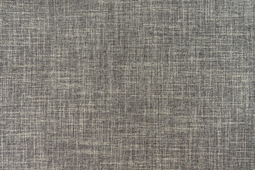 Fototapeta na wymiar Texture of natural upholstery fabric or cloth. Fabric texture of natural cotton or linen textile material. Gray canvas background. Decorative fabric for curtain, furniture, walls, clothes