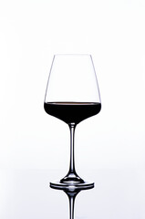 red wine glass on a white background