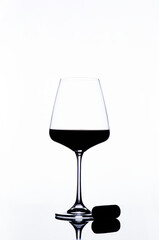 red wine glass on a white background