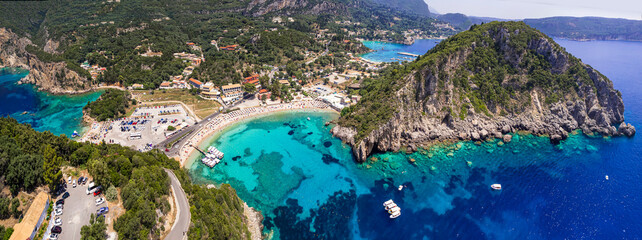 Greece. Corfu island best beaches. Stunning Paleokastritsa bay with turquoise sea. Aerial drone view of Agios Spiridon beach - obrazy, fototapety, plakaty