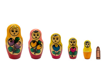 Traditional Russian national dolls (Matryoshka) and the bullet of the army white background