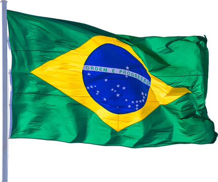 Flag of Brazil blowing in the wind on the flagpole.