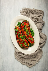 Traditional Turkish dish, Imam Bayildi , stuffed eggplant, with tomatoes and herbs, baked, no people, homemade,