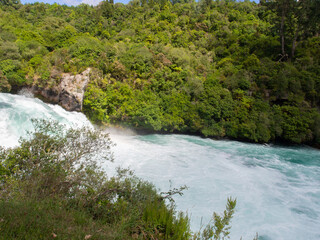 Flowing Waikato River By Huka Falls