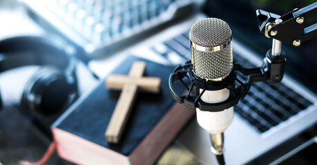 Fototapeta Christian radio broadcast, podcast studio interior. preacher reads the bible online, records a podcast. obraz